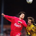 Jari Litmanen of Liverpool takes the ball past Edwin van der Sar of Fulham to score the second goal