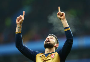BIRMINGHAM, ENGLAND - DECEMBER 13: Olivier Giroud of Arsenal celebrates as he scores their first goal from a penalty during the Barclays Premier League match between Aston Villa and Arsenal at Villa Park on December 13, 2015 in Birmingham, England. (Photo by Clive Mason/Getty Images)