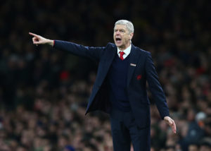 LONDON, ENGLAND - DECEMBER 21: Arsene Wenger, manager of Arsenal gives instructions during the Barclays Premier League match between Arsenal and Manchester City at Emirates Stadium on December 21, 2015 in London, England. (Photo by Clive Rose/Getty Images)