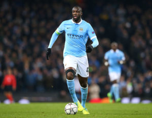 MANCHESTER, ENGLAND - MARCH 15: Yaya Toure of Manchester City FC runs with the ball during the UEFA Champions League Round of 16 Second Leg match between Manchester City FC and FC Dynamo Kyiv at Etihad Stadium on March 15, 2016 in Manchester, United Kingdom. (Photo by Alex Livesey/Getty Images)