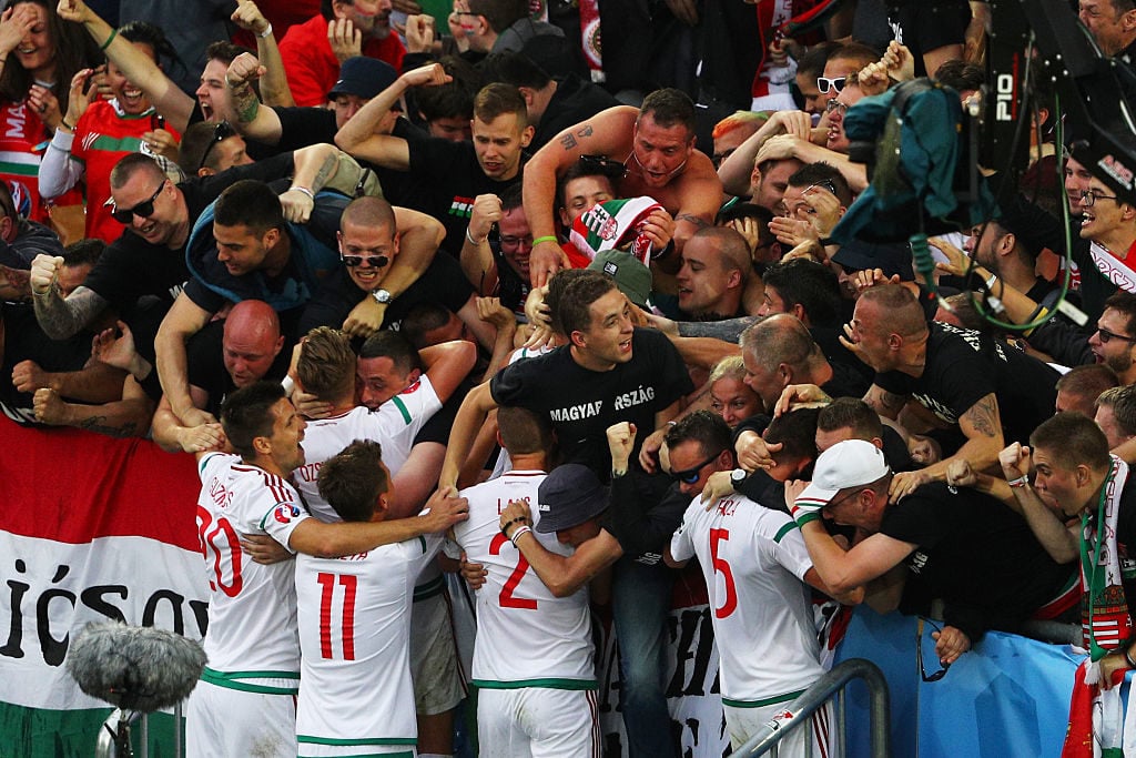 BORDEAUX, FRANCE - JUNE 14:  Hungary players celebrate their team's first goal with supporters during the UEFA EURO 2016 Group F match between Austria and Hungary at Stade Matmut Atlantique on June 14, 2016 in Bordeaux, France.  (Photo by Ian Walton/Getty Images)