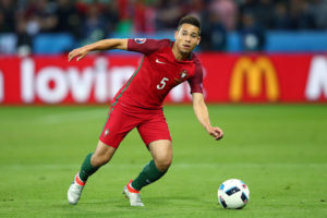 SAINT-ETIENNE, FRANCE - JUNE 14: Raphael Guerreiro of Portugal in action during the UEFA EURO 2016 Group F match between Portugal and Iceland at Stade Geoffroy-Guichard on June 14, 2016 in Saint-Etienne, France. (Photo by Clive Brunskill/Getty Images)