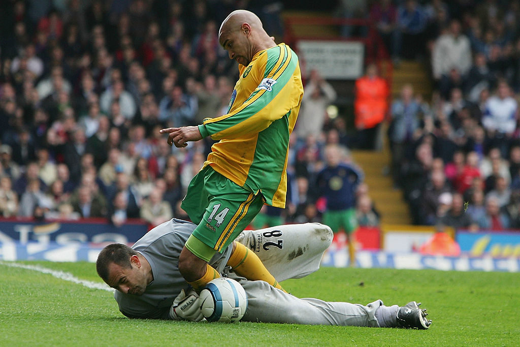 LONDON, ENGLAND - APRIL 16: Gabor Kiraly of Palace saves at the feet of Leon McKenzie of Norwich during the Barclays Premiership match between Crystal Palace and Norwich City at Selhurst Park Stadium on April 16, 2005 in London, England. (Photo by Jamie McDonald/Getty Images)