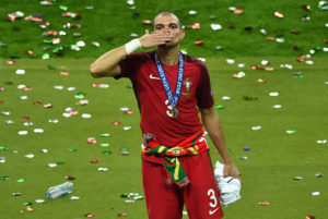 PARIS, FRANCE - JULY 10: Pepe of Portugal celebrates after his team's 1-0 win against France in the UEFA EURO 2016 Final match between Portugal and France at Stade de France on July 10, 2016 in Paris, France. (Photo by Dan Mullan/Getty Images)