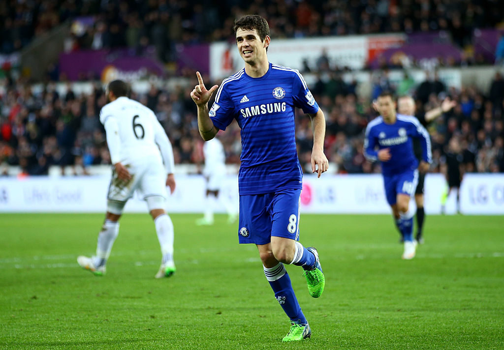 SWANSEA, WALES - JANUARY 17: Oscar of Chelsea celebrates after scoring his team's fourth goal during the Barclays Premier League match between Swansea City and Chelsea at Liberty Stadium on January 17, 2015 in Swansea, Wales. (Photo by Richard Heathcote/Getty Images)