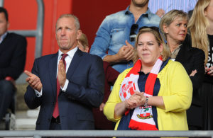 SOUTHAMPTON, ENGLAND - AUGUST 09: Southampton chairman Ralph Krueger (L) and Southampton owner Katharina Liebherr before the start of the pre season friendly match between Southampton and Bayer Leverkusen at St Mary's Stadium on August 9, 2014 in Southampton, England. (Photo by Robin Parker/Getty Images)