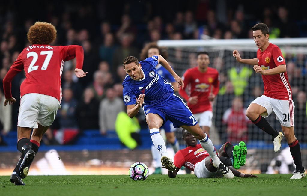 LONDON, ENGLAND - OCTOBER 23:  Nemanja Matic of Chelsea is tackled by Ander Herrera of Manchester United and Eric Bailly of Manchester United during the Premier League match between Chelsea and Manchester United at Stamford Bridge on October 23, 2016 in London, England.  (Photo by Shaun Botterill/Getty Images)