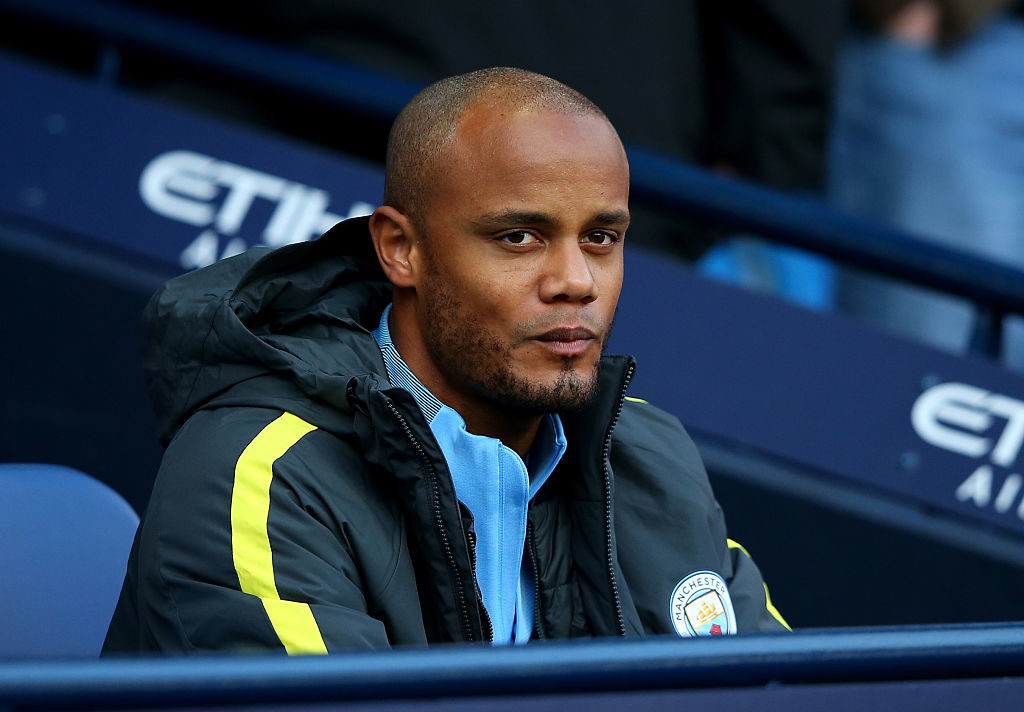 MANCHESTER, ENGLAND - OCTOBER 15: Vincent Kompany of Manchester City takes his seat on the bench during the Premier League match between Manchester City and Everton at Etihad Stadium on October 15, 2016 in Manchester, England.  (Photo by Alex Livesey/Getty Images)