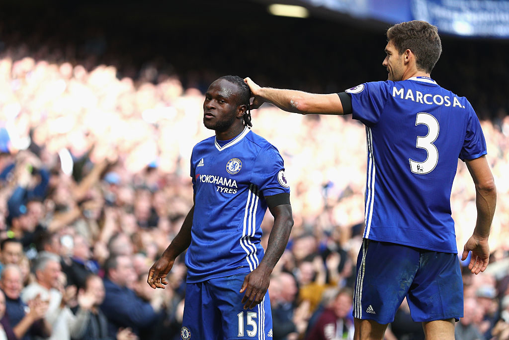 LONDON, ENGLAND - OCTOBER 15: Victor Moses of Chelsea (L) celebrates scoring his sides third goal with Marcos Alonso of Chelsea (R) during the Premier League match between Chelsea and Leicester City at Stamford Bridge on October 15, 2016 in London, England. (Photo by Ian Walton/Getty Images)
