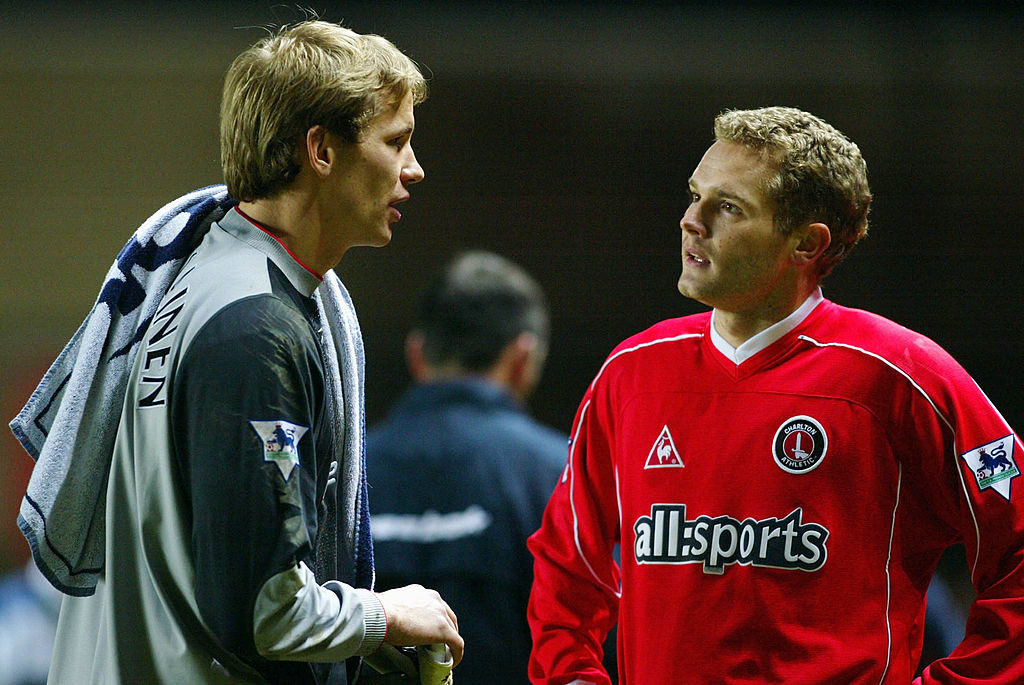 LONDON - JANUARY 18: Jonatan Johansson of Charlton Athletic and Jussi Jaaskelainen of Bolton Wanderers after the FA Barclaycard Premiership match between Charlton Athletic v Bolton Wanderers at the Valley, London on January 18, 2003. (Photo by Phil Cole/Getty Images)