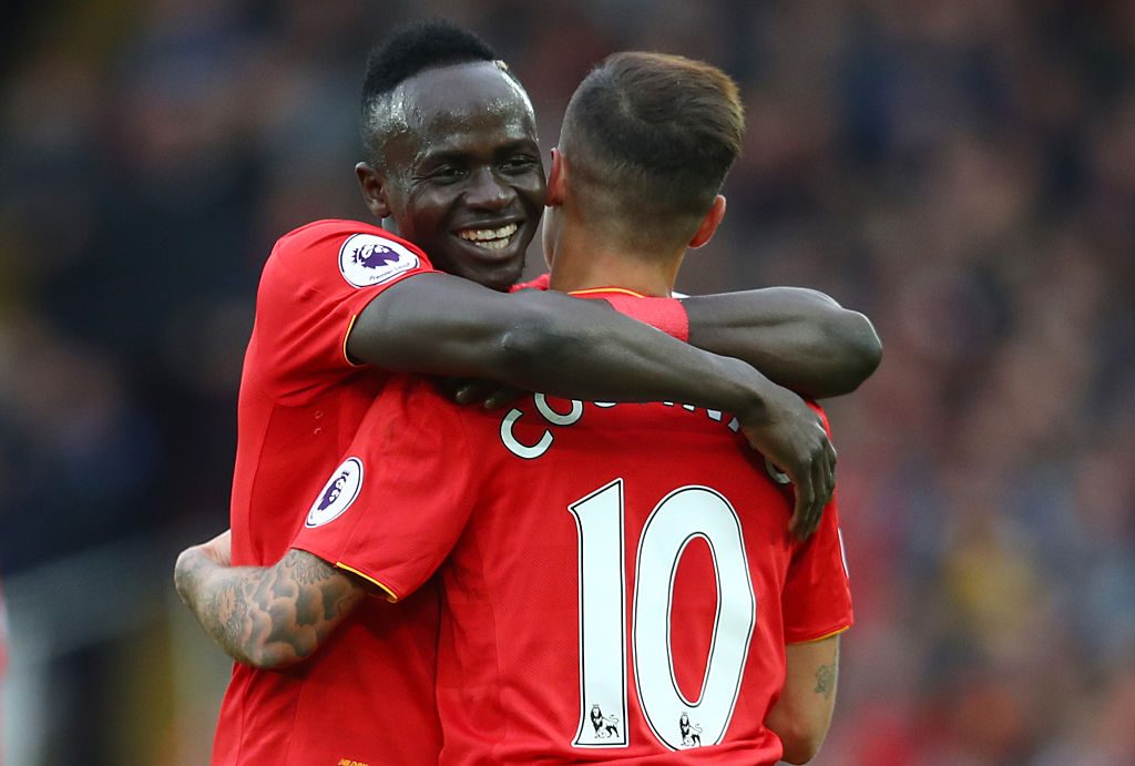 LIVERPOOL, ENGLAND - NOVEMBER 06: Philippe Coutinho of Liverpool celebrates scoring his sides second goal with Sadio Mane of Liverpool during the Premier League match between Liverpool and Watford at Anfield on November 6, 2016 in Liverpool, England. (Photo by Clive Brunskill/Getty Images)