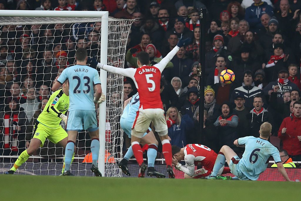 LONDON, ENGLAND - JANUARY 22: Laurent Koscielny (2nd R) of Arsenal is challenged by Ben Mee (1st R) of Burnley in the box resulting in a penalty to Arsenal during the Premier League match between Arsenal and Burnley at the Emirates Stadium on January 22, 2017 in London, England. (Photo by Julian Finney/Getty Images)