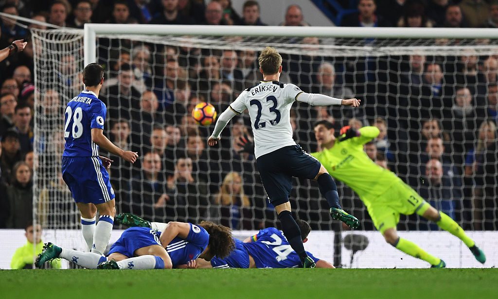 LONDON, ENGLAND - NOVEMBER 26: Christian Eriksen of Tottenham Hotspur scores the opening goal during the Premier League match between Chelsea and Tottenham Hotspur at Stamford Bridge on November 26, 2016 in London, England. (Photo by Shaun Botterill/Getty Images)