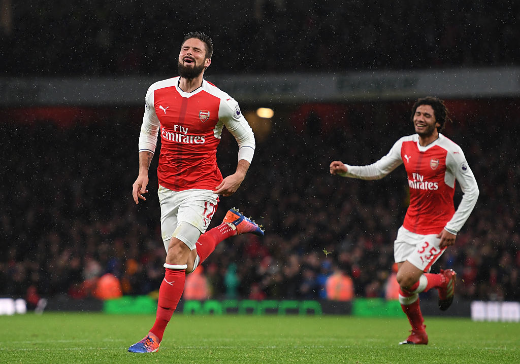 LONDON, ENGLAND - JANUARY 01: Olivier Giroud #12 of Arsenal celebrates after scoring the opening goal during the Premier League match between Arsenal and Crystal Palace at the Emirates Stadium on January 1, 2017 in London, England. (Photo by Shaun Botterill/Getty Images)