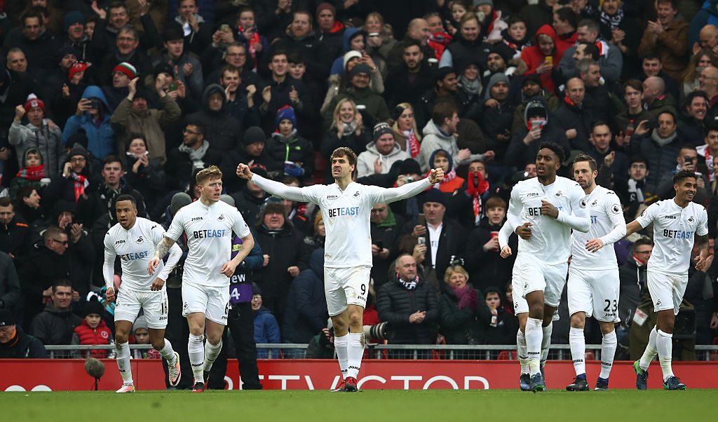 LIVERPOOL, ENGLAND - JANUARY 21: Fernando Llorente of Swansea City celebrates scoring his sides second goal during the Premier League match between Liverpool and Swansea City at Anfield on January 21, 2017 in Liverpool, England. (Photo by Julian Finney/Getty Images)