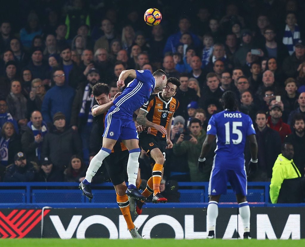 LONDON, ENGLAND - JANUARY 22: Ryan Mason of Hull City and Gary Cahill of Chelsea collide during the Premier League match between Chelsea and Hull City at Stamford Bridge on January 22, 2017 in London, England.  (Photo by Clive Rose/Getty Images)