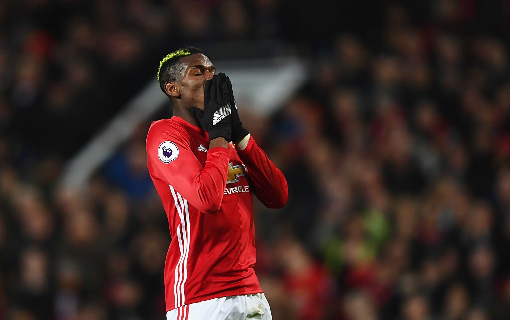 MANCHESTER, ENGLAND - JANUARY 15: Paul Pogba of Manchester United reacts during the Premier League match between Manchester United and Liverpool at Old Trafford on January 15, 2017 in Manchester, England. (Photo by Laurence Griffiths/Getty Images)