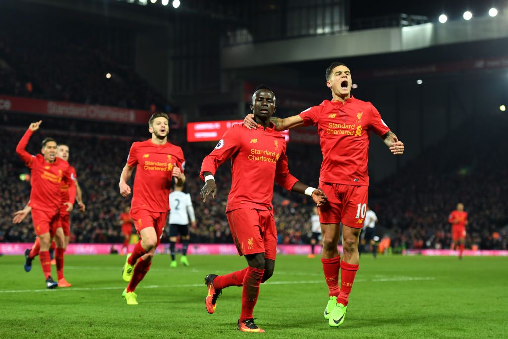 LIVERPOOL, ENGLAND - FEBRUARY 11: Sadio Mane (2nd R) of Liverpool celebrates scoring his side's second goal with his team mate Philippe Coutinho (1st R) during the Premier League match between Liverpool and Tottenham Hotspur at Anfield on February 11, 2017 in Liverpool, England. (Photo by Mike Hewitt/Getty Images for Tottenham Hotspur FC)