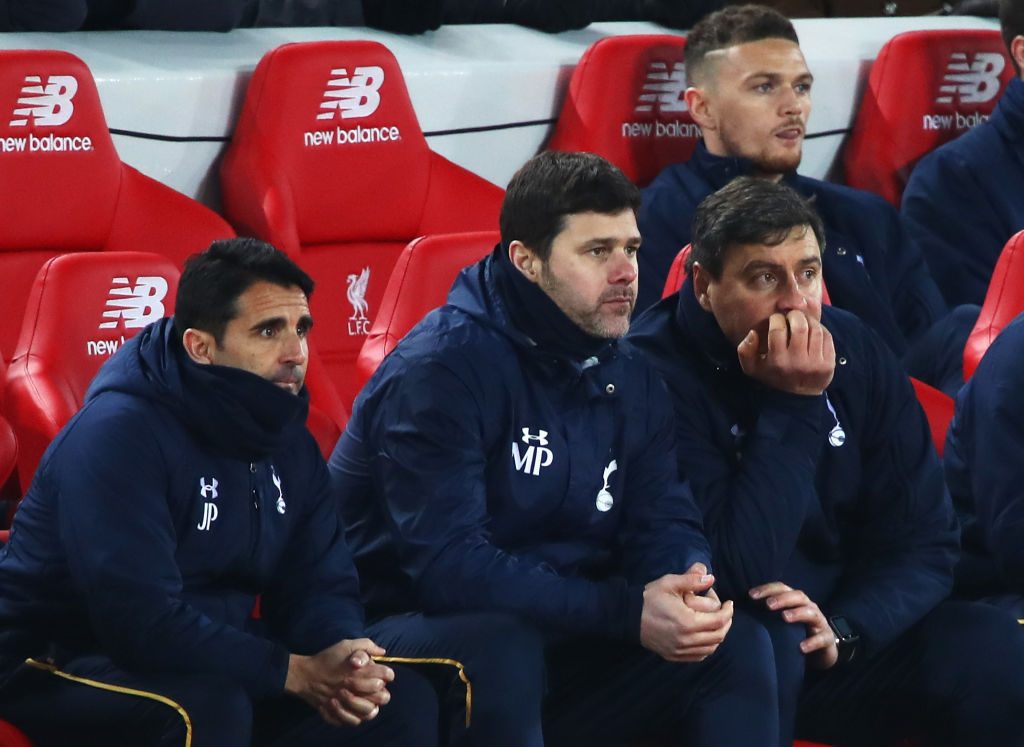 LIVERPOOL, ENGLAND - FEBRUARY 11: Mauricio Pochettino, Manager of Tottenham Hotspur (C) looks on during the Premier League match between Liverpool and Tottenham Hotspur at Anfield on February 11, 2017 in Liverpool, England. (Photo by Clive Brunskill/Getty Images)