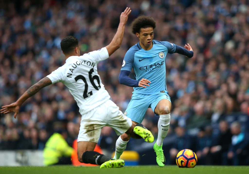 MANCHESTER, ENGLAND - FEBRUARY 05: Leroy Sane of Manchester City takes on Kyle Naughton of Swansea City during the Premier League match between Manchester City and Swansea City at Etihad Stadium on February 5, 2017 in Manchester, England. (Photo by Alex Livesey/Getty Images)