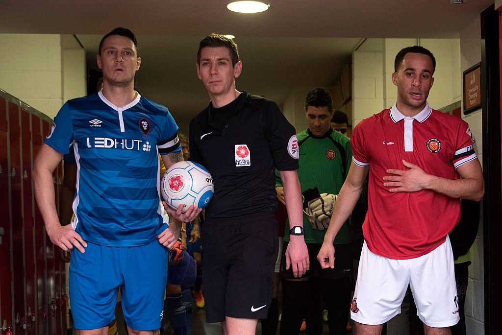 MANCHESTER, ENGLAND - JANUARY 28: Jerome Wright of FC United of Manchester and Simon Grand of Salford City stand in the tunnel before the National League North match between FC United of Manchester v Salford City at the Broadhurst Park on January 28, 2017 in Manchester, England (Photo by Nathan Stirk/Getty Images)