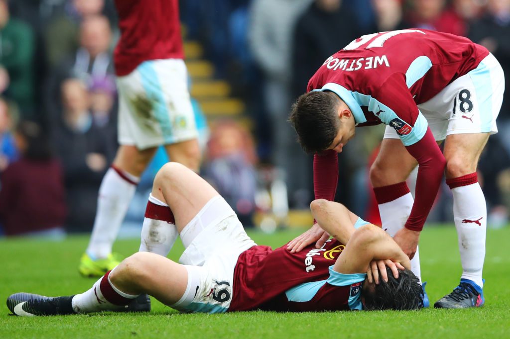 BURNLEY, ENGLAND - FEBRUARY 18: Joey Barton of Burnley (C) holds his head during The Emirates FA Cup Fifth Round match between Burnley and Lincoln City at Turf Moor on February 18, 2017 in Burnley, England.  (Photo by Clive Brunskill/Getty Images)