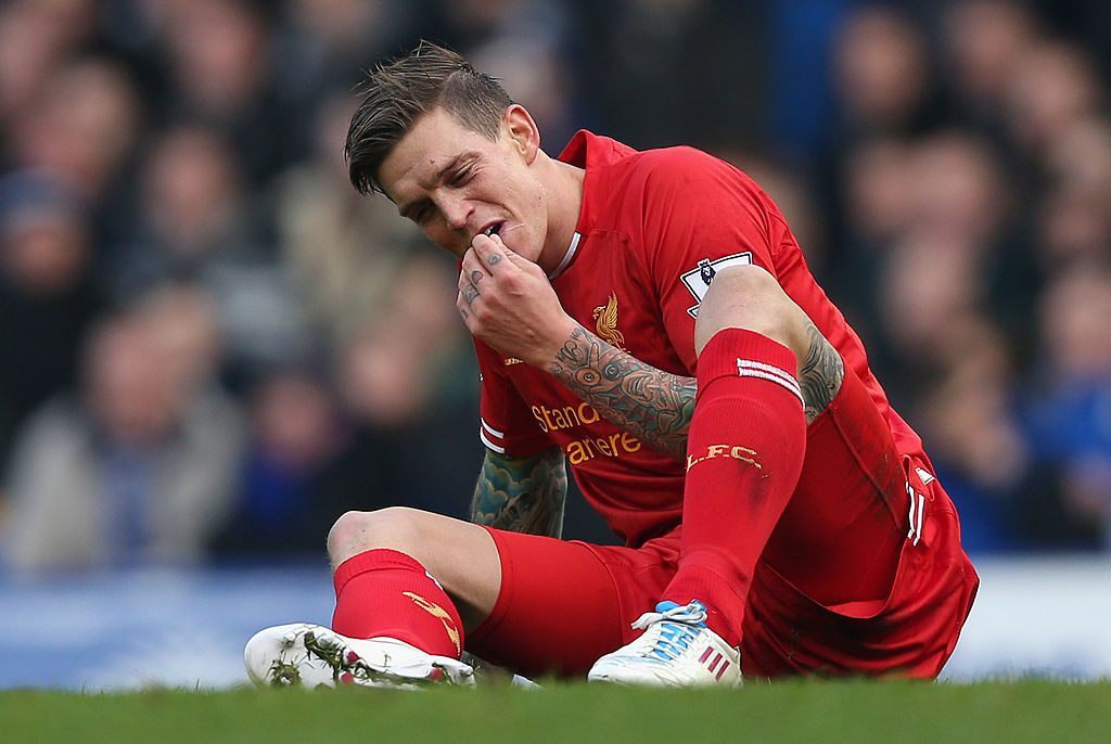 LIVERPOOL, ENGLAND - NOVEMBER 23: Daniel Agger of Liverpool reacts during the Barclays Premier League match between Everton and Liverpool at Goodison Park on November 23, 2013 in Liverpool, England. (Photo by Clive Brunskill/Getty Images)