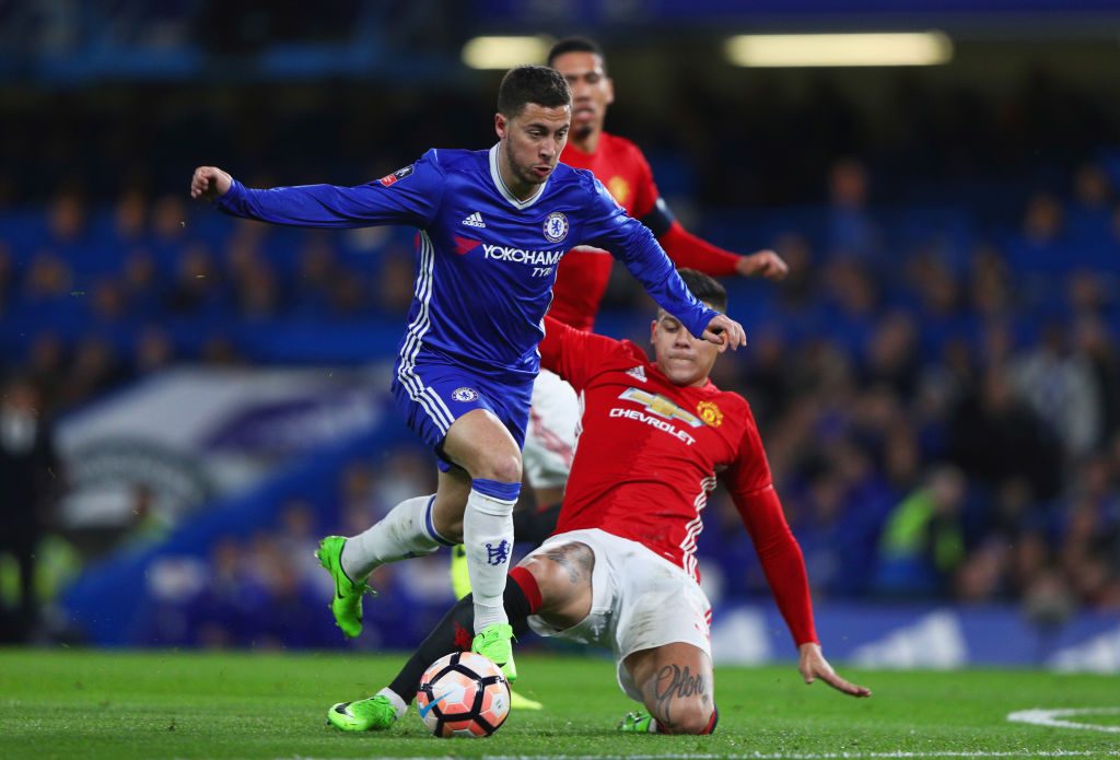LONDON, ENGLAND - MARCH 13: Eden Hazard of Chelsea evades Paul Pogba of Manchester United during The Emirates FA Cup Quarter-Final match between Chelsea and Manchester United at Stamford Bridge on March 13, 2017 in London, England. (Photo by Ian Walton/Getty Images)