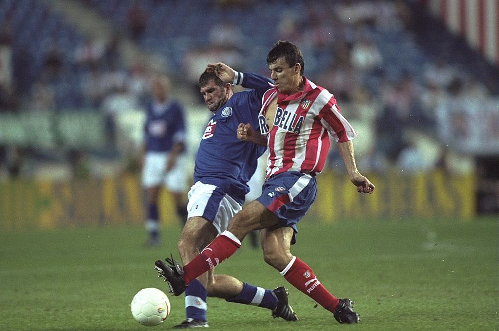 16 Sep 1997: Dan Prodan (right) of Athletico Madrid and Ian Marshall (left) of Leicester City struggle for possession of the ball during the UEFA Cup First Round match at the Vincente Calderon in Madrid, Spain. Athletico Madrid won the match 2-1. Mandatory Credit: Ben Radford/Allsport