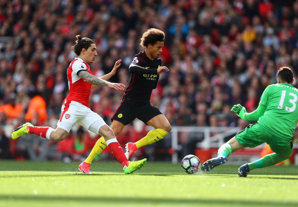 LONDON, ENGLAND - APRIL 02:  Leroy Sane of Manchester City (C) rounds Petr Cech of Arsenal (R) and scores his sides first goal during the Premier League match between Arsenal and Manchester City at Emirates Stadium on April 2, 2017 in London, England.  (Photo by Clive Rose/Getty Images)