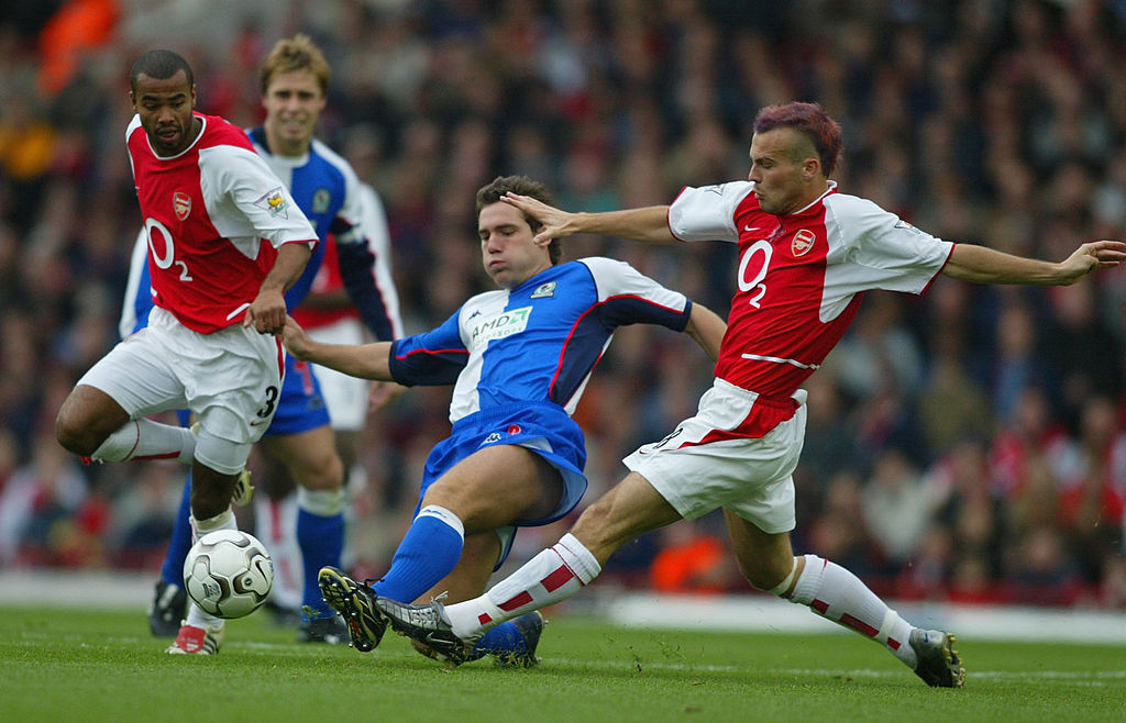 Dunn battles with Ljungberg and Cole