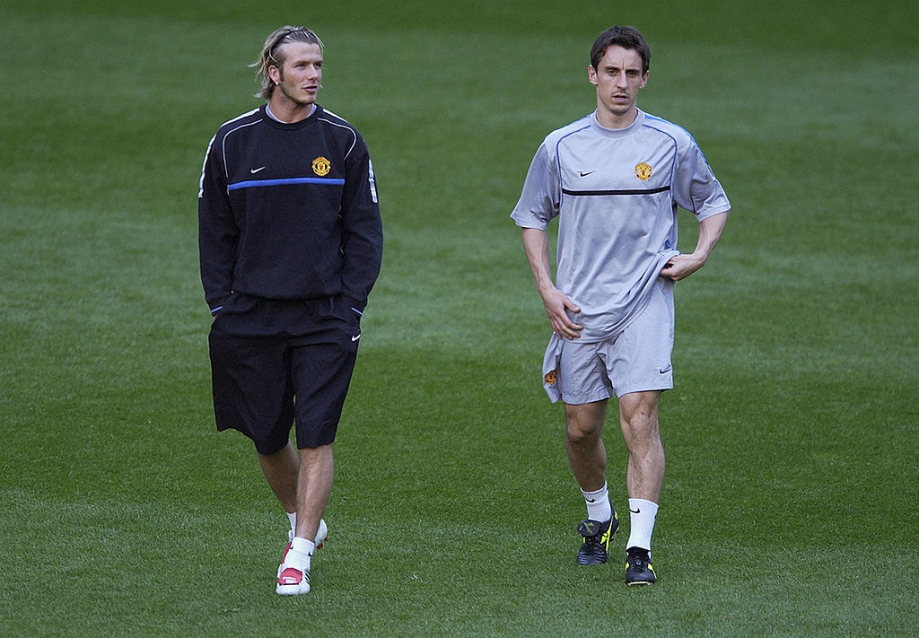 David Beckham and Gary Neville of Manchester United walking