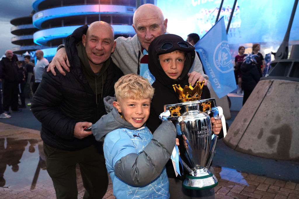 Manchester City Fans Celebrate Winning the Premier League Title