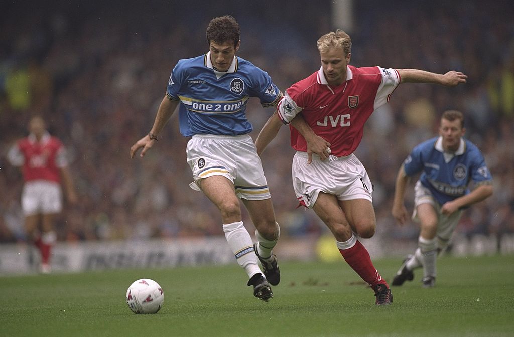 Slaven Bilic of Everton and Dennis Bergkamp of Arsenal