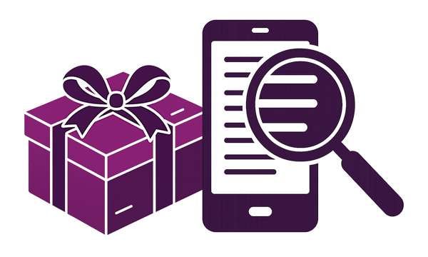 Lahjapaketti, puhelin jossa kasinosivu auki ja suurennuslasi: Bonusehtojen tarkistaminen ennen pelaamista on tärkeää