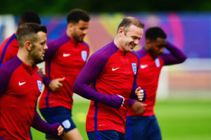 CHANTILLY, FRANCE - JUNE 10: Wayne Rooney (2R) warms up with team mates during an England training session on the eve their opening match of UEFA EURO 2016 against Russia at Stade du Bourgognes on June 10, 2016 in Chantilly, France. (Photo by Dan Mullan/Getty Images)