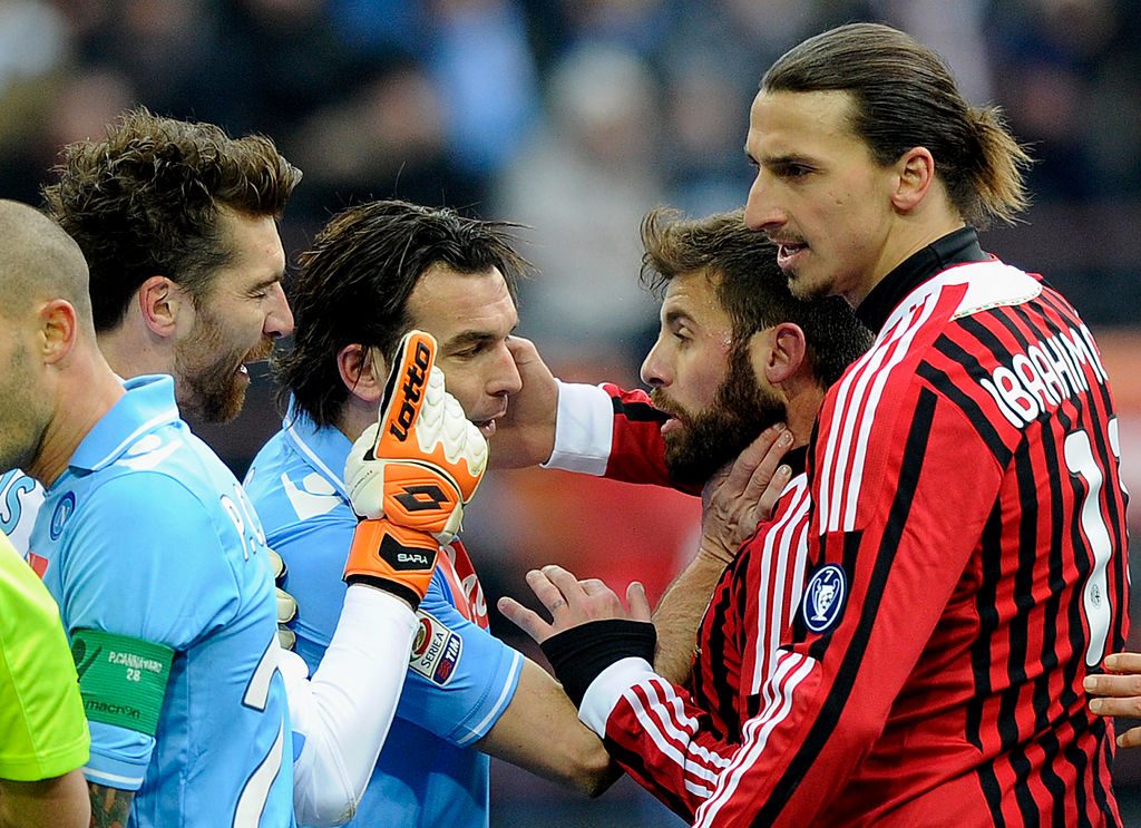 MILAN, ITALY - FEBRUARY 05: Zlatan Ibrahimovic (R) of AC Milan and team-mate Antonio Nocerino (2nd R) argue with Morgan De Sanctis (L) and Salvatore Aronica of SSC Napoli before Zlatan Ibrahimovic is shown the red card during the Serie A match between AC Milan and SSC Napoli at Stadio Giuseppe Meazza on February 5, 2012 in Milan, Italy. (Photo by Claudio Villa/Getty Images)